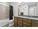 Stylish bathroom featuring modern fixtures, decorative wall art, and a sleek vanity with ample storage space at 16244 Thunder Cat Way, Monument, CO 80132