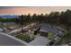 An aerial view showcases this home's exterior, professional landscaping, and mountain views in the background at 16244 Thunder Cat Way, Monument, CO 80132
