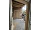 Small outdoor balcony with an entrance to the building at 9220 Wilde Ln # 102, Parker, CO 80134