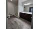 Modern bathroom with a glass shower, large vanity, and updated fixtures throughout at 9220 Wilde Ln # 102, Parker, CO 80134