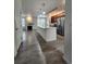 Open kitchen floor plan featuring a kitchen island and stainless steel appliances at 9220 Wilde Ln # 102, Parker, CO 80134
