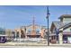 Exterior view of a movie theater in a shopping center at 3929 S Quemoy Ct, Aurora, CO 80018