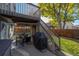 Spacious deck with seating area and access to the backyard at 3929 S Quemoy Ct, Aurora, CO 80018