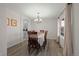 Formal dining room with hardwood floors and chandelier at 3929 S Quemoy Ct, Aurora, CO 80018