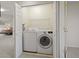 Convenient laundry room with washer and dryer at 3929 S Quemoy Ct, Aurora, CO 80018