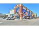 Brick retail building with large windows and storefront at 3929 S Quemoy Ct, Aurora, CO 80018