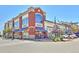 Brick retail building with large windows and storefront at 3929 S Quemoy Ct, Aurora, CO 80018