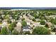 Aerial view of neighborhood with many mature trees and homes at 2078 Goldfinch Ct, Longmont, CO 80503