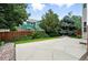 Beautiful backyard patio with adjacent lawn at 2078 Goldfinch Ct, Longmont, CO 80503