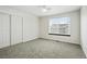 Bedroom with window and a large closet at 2078 Goldfinch Ct, Longmont, CO 80503