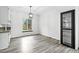 Dining area with a modern display cabinet and natural light, perfect for Gathering gatherings at 2078 Goldfinch Ct, Longmont, CO 80503