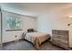 Cozy bedroom with ample natural light from the window at 7897 Allison Way # 304, Arvada, CO 80005