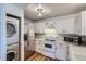 Bright kitchen featuring stainless steel appliances and white cabinetry at 7897 Allison Way # 304, Arvada, CO 80005