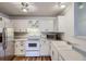 Well-lit kitchen with stainless steel appliances and ample cabinet space at 7897 Allison Way # 304, Arvada, CO 80005