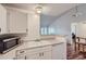 Open kitchen with modern microwave and stainless steel sink at 7897 Allison Way # 304, Arvada, CO 80005