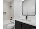 Beautiful bathroom features black hardware and accents, and tiled shower at 1252 Yates St, Denver, CO 80204