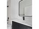 Modern bathroom featuring stylish fixtures, a sleek vanity, and a shower-tub combo at 1252 Yates St, Denver, CO 80204