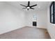 Neutral bedroom with carpet, ceiling fan, and ensuite bathroom at 1252 Yates St, Denver, CO 80204