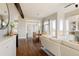 Modern kitchen with dark cabinetry, granite countertops, and stainless steel appliances at 2869 Kingston St, Denver, CO 80238