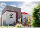 Modern restaurant exterior with outdoor patio and signage at 2869 Kingston St, Denver, CO 80238