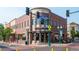Well-maintained commercial building at a street corner with appealing architectural details at 6705 Nelson St, Arvada, CO 80004
