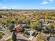 Aerial view showcasing a ranch home and surrounding area at 3045 Xanadu St, Aurora, CO 80011