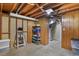 Unfinished basement with storage shelving at 3045 Xanadu St, Aurora, CO 80011