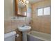 Bathroom with pedestal sink, shower/tub combo at 3045 Xanadu St, Aurora, CO 80011