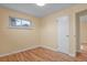 Well-lit bedroom with hardwood floors and closet at 3045 Xanadu St, Aurora, CO 80011