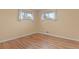 Spacious bedroom with hardwood floors and windows at 3045 Xanadu St, Aurora, CO 80011