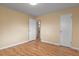 Bedroom with hardwood floors and access to bathroom at 3045 Xanadu St, Aurora, CO 80011