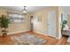 Bright dining area with hardwood floors and a lovely chandelier at 3045 Xanadu St, Aurora, CO 80011