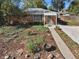 Landscaped yard with a brick ranch home at 3045 Xanadu St, Aurora, CO 80011