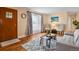 Living room showcasing hardwood floors and a warm, inviting atmosphere at 3045 Xanadu St, Aurora, CO 80011