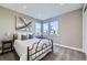 Comfortable bedroom with carpet, natural light, and simple decor at 6005 Beeler St, Denver, CO 80238