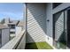 Balcony with green turf and view of another home at 14046 E Stanford Cir # I11, Aurora, CO 80015