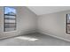 Bright, spacious bedroom with ample natural light from large windows at 14046 E Stanford Cir # I11, Aurora, CO 80015