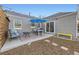 Backyard patio with a modern outdoor seating area, perfect for outdoor dining and entertaining at 2555 Hudson St, Denver, CO 80207