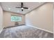 Empty bedroom featuring neutral paint, carpet floors, a ceiling fan, and natural light at 3022 S Wheeling S Way # 410, Aurora, CO 80014