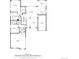 Floor plan showcasing the ground floor, kitchen, living area, and garage layout of this home at 34 Sommerset Cir, Englewood, CO 80111