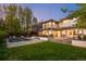 Expansive backyard with a pool, patio seating, and well-manicured lawn at 19 S Eudora St, Denver, CO 80246