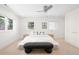 Bright bedroom featuring neutral carpeting, white walls, recessed lights, and a modern ceiling fan at 19 S Eudora St, Denver, CO 80246