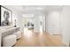 Bright foyer with hardwood floors, white walls, and views to the outside at 19 S Eudora St, Denver, CO 80246