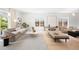 Bright living room featuring modern furniture, hardwood floors, and natural light at 19 S Eudora St, Denver, CO 80246