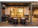 Inviting outdoor patio with a dining area, grill, and seamless access to the home's interior through sliding glass doors at 19 S Eudora St, Denver, CO 80246