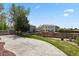 Spacious backyard with patio, lawn, and privacy fence in background at 4713 S Ireland St, Aurora, CO 80015