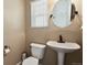 Cozy powder room features pedestal sink and natural light at 4713 S Ireland St, Aurora, CO 80015
