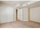 Bedroom showing carpeted floor and closet with sliding doors at 4713 S Ireland St, Aurora, CO 80015