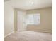 Bedroom showing carpeted floor and window with blinds at 4713 S Ireland St, Aurora, CO 80015
