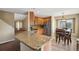 Spacious kitchen featuring granite countertops, stainless steel appliances, and an open layout at 4713 S Ireland St, Aurora, CO 80015